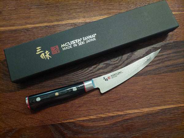 Mcusta Zanmai Classic Pro Zebra Damascus Úrbeiningarhnífur 16,5cm