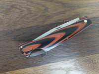 Adam Þórarinsson Baklás Svart/Rautt Micarta N690